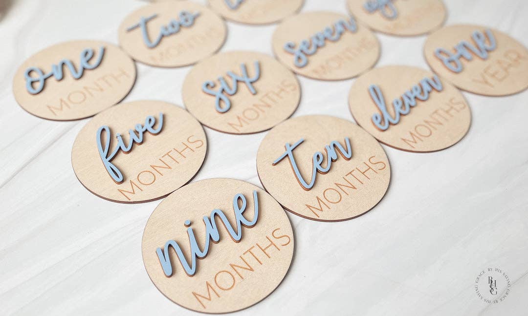 3D Wooden Monthly Milestone Discs With Light Pink Letters 