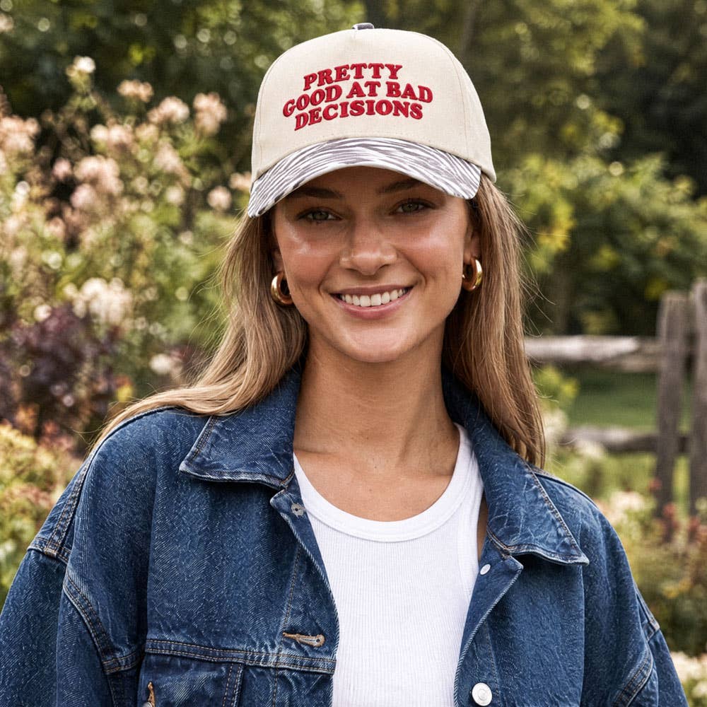 PRETTY GOOD AT BAD DECISIONS TRUCKER HAT